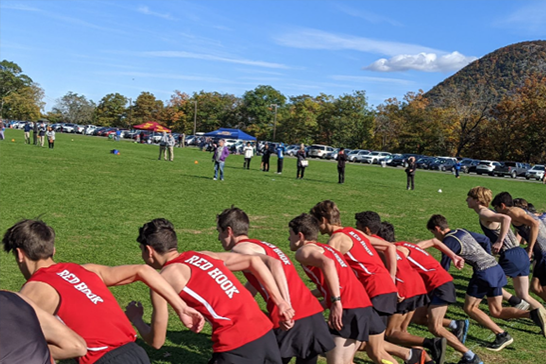 Photo of the Red Hook cross country team getting ready to run.